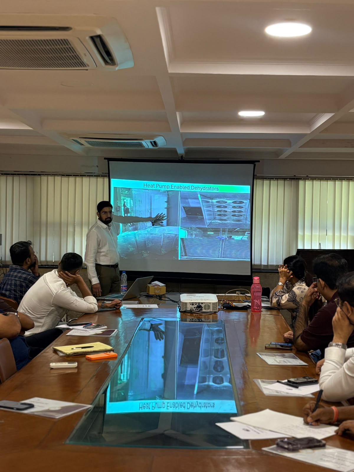 Heat pump enabled dehydrators presentation during dehydration methods training in New Delhi