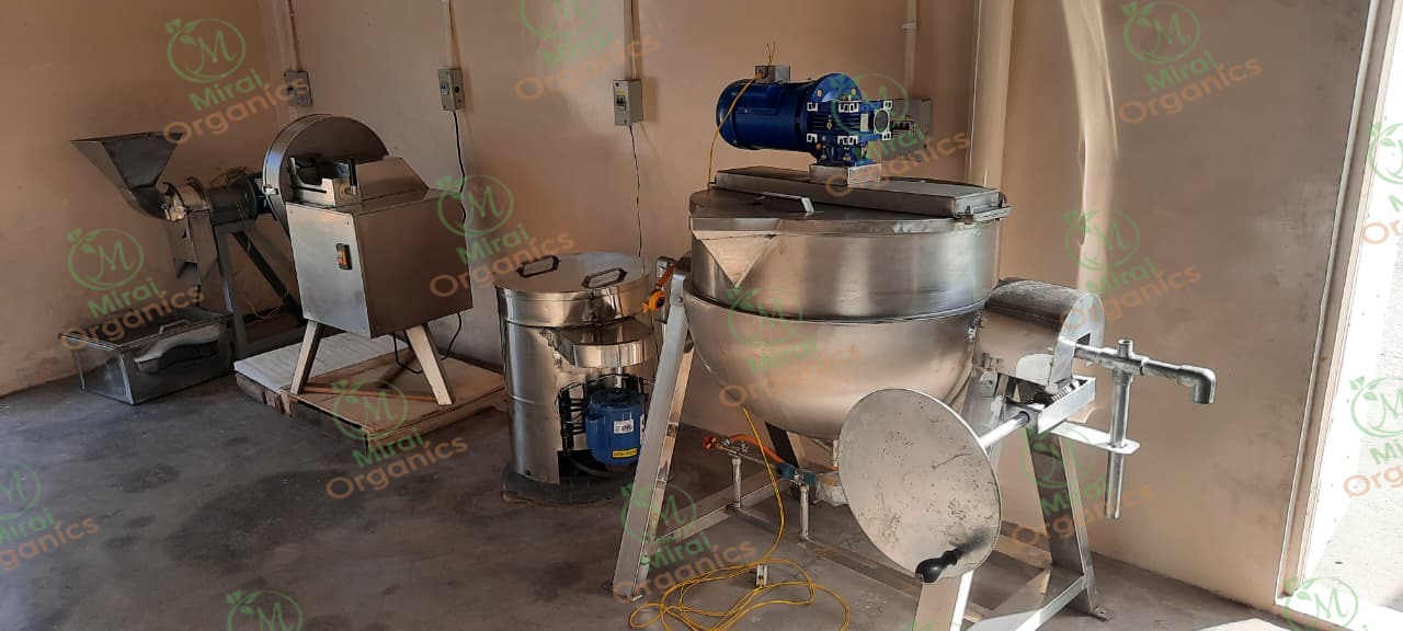 Kettle, grinder and mixer machinery used in processing at the Mirai Organics facility